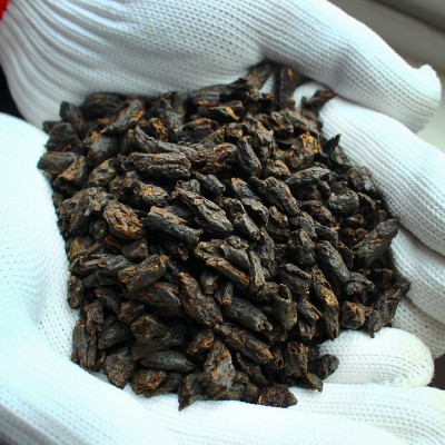 云南普洱茶熟茶碎银子 糯香茶化石 勐海老树茶原料老茶头厂家批发图2
